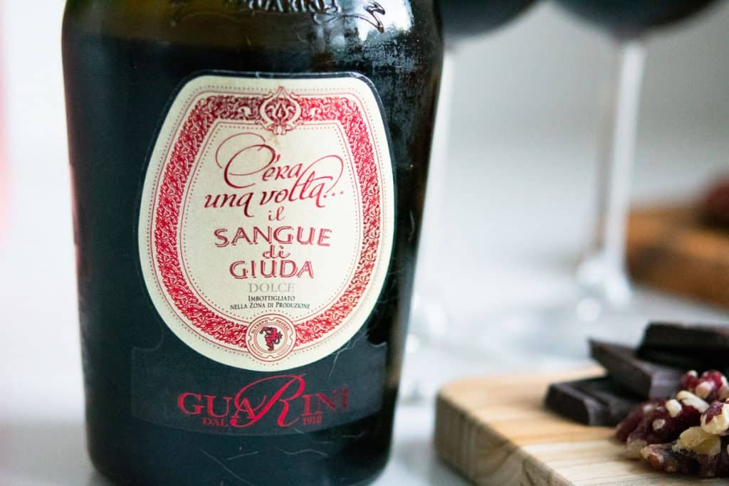 Label for Sangue di Giuda Dolce wine from Guarini