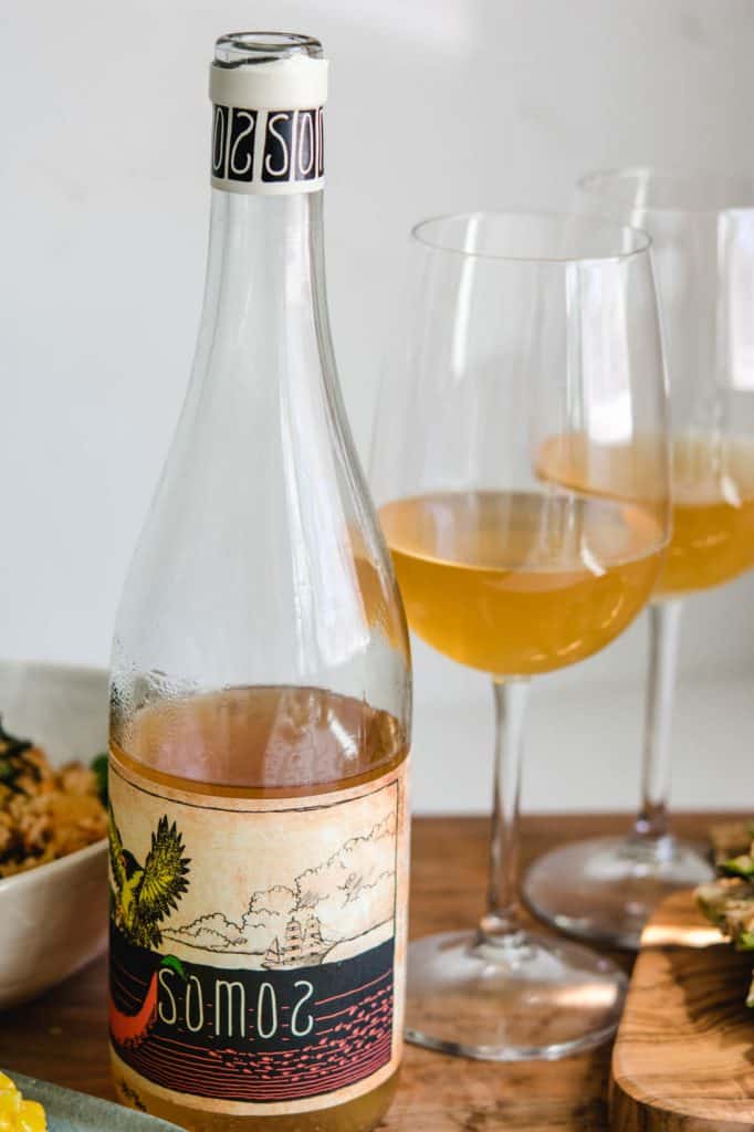 Somos Orange Verdehlo Wine bottle and 2 glasses