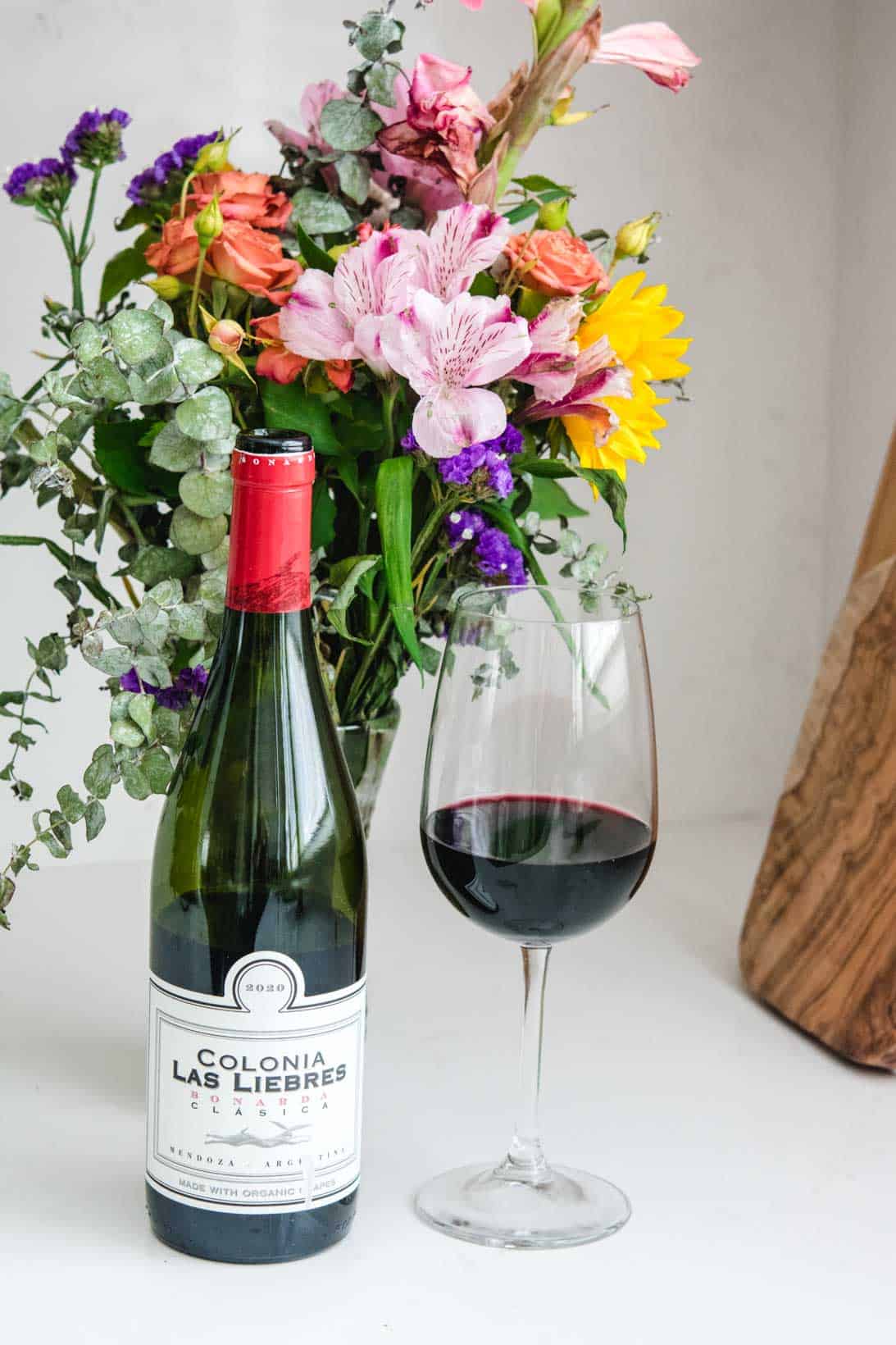 Colonia Bonarda Wine bottle and glass