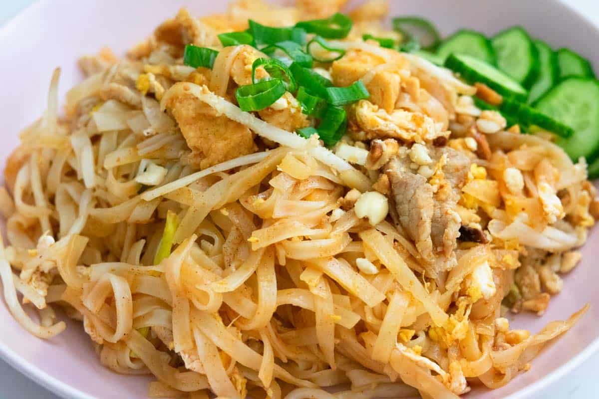 Pad Thai in a pink bowl