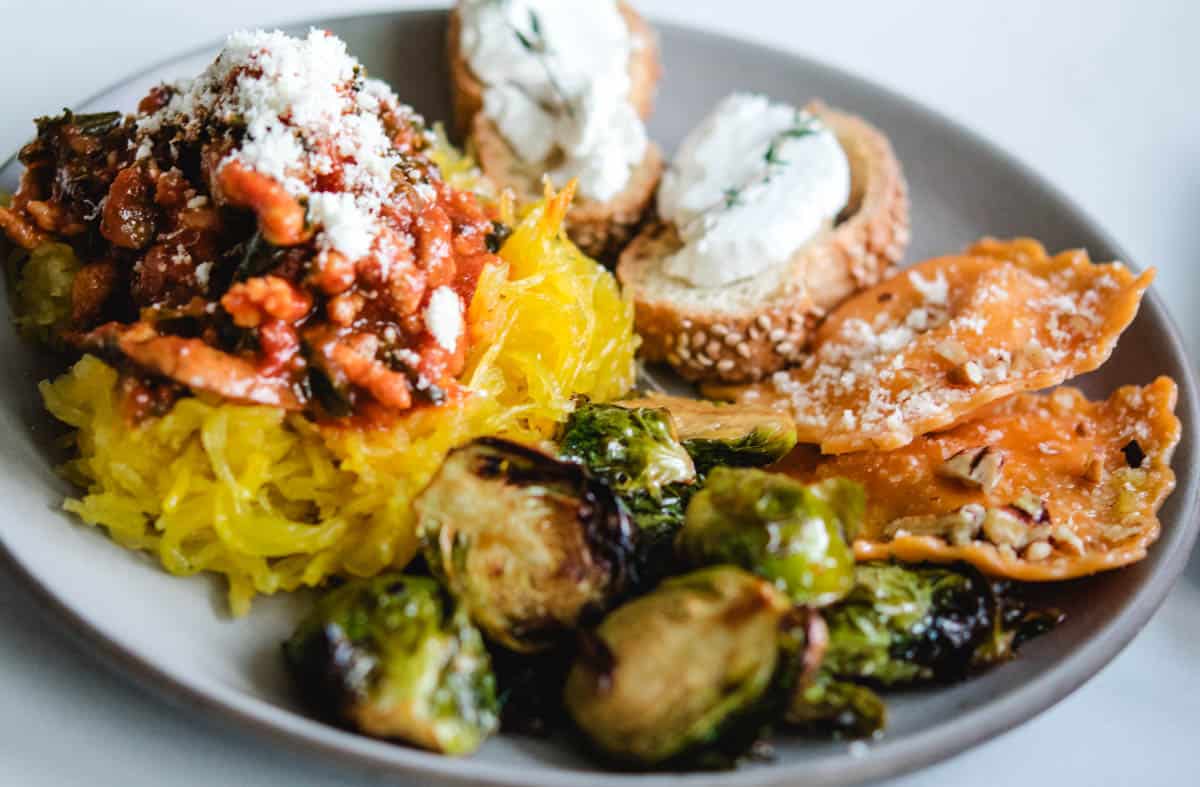 Round gray plate of food pairings for Coppo wines
