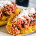 Spaghetti squash with turkey bolognese and parmesan cheese
