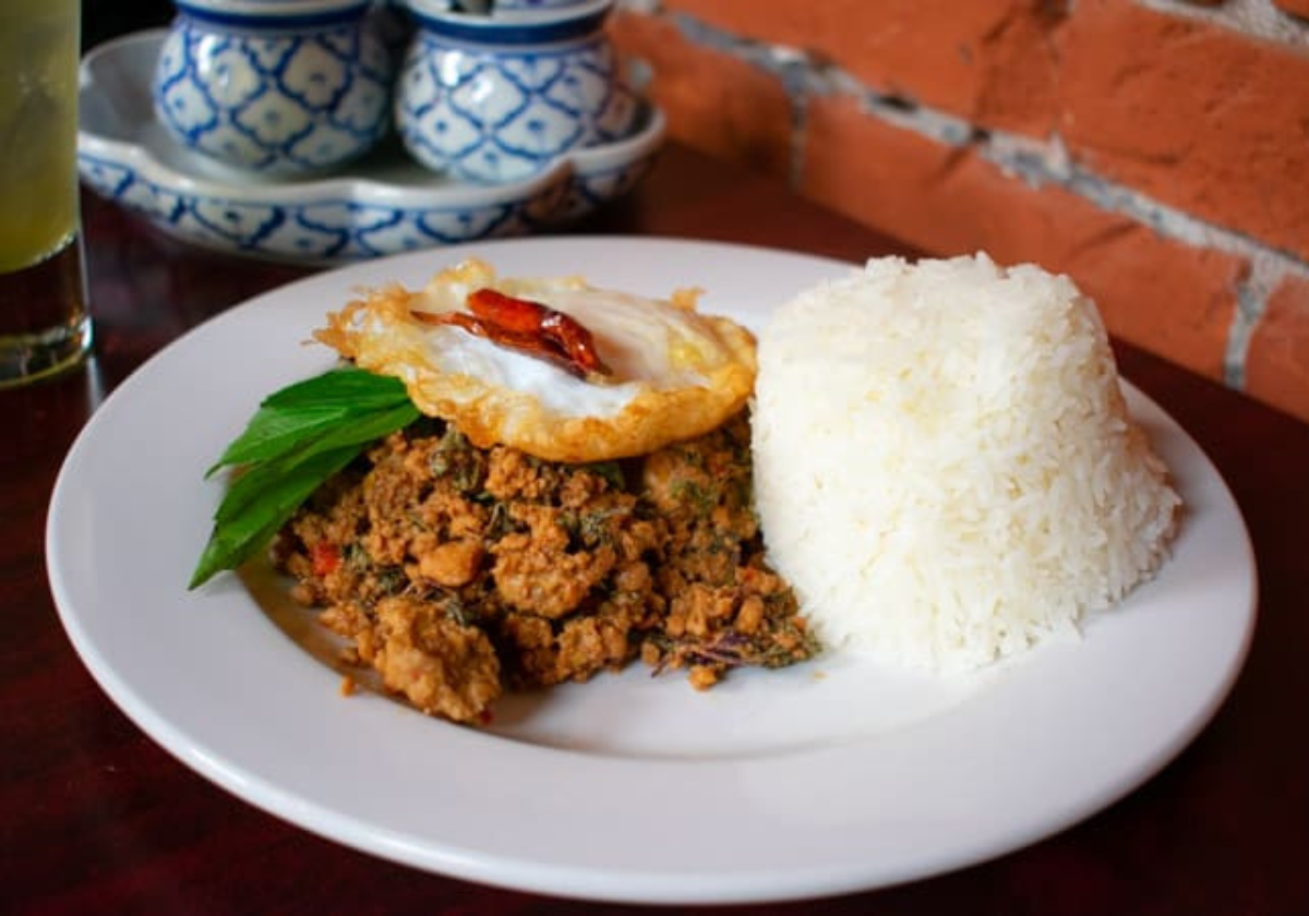 Thai Basil Chicken with white rice and a fried egg